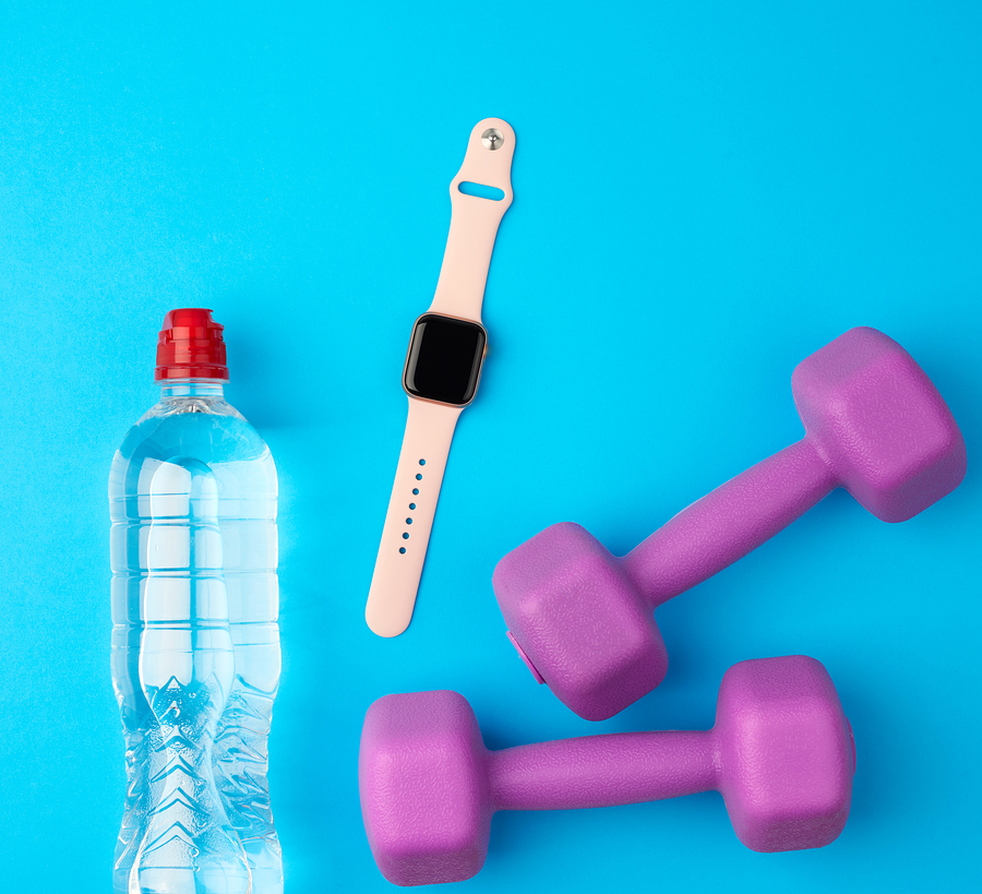 Purple Plastic Kettlebells, A Transparent Bottle Of Water And A Smart Watch; your own product here!