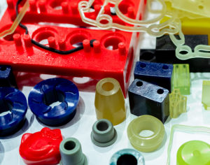 Engineering grade plastics. Plastic material used in manufacturing industry. Global engineering plastic market concept. Polyurethane and abs plastic parts materials. Plastic injection machine products.
