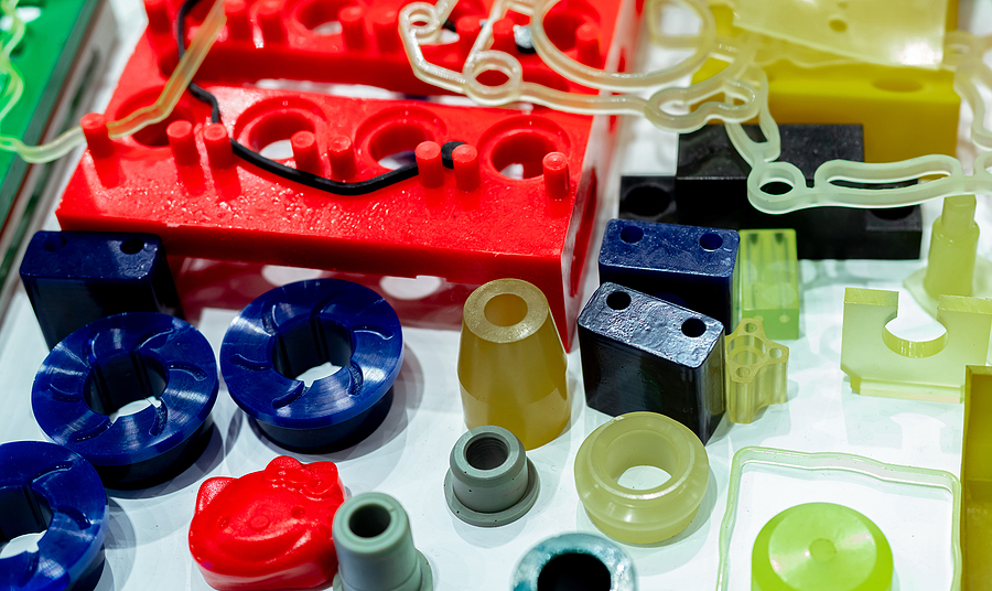 Engineering grade plastics. Plastic material used in manufacturing industry. Global engineering plastic market concept. Polyurethane and abs plastic parts materials. Plastic injection machine products.
