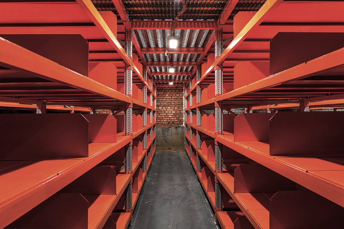 Large warehouse with steel shelves, Empty warehouse racks, Empty metal shelf in storage room, empty shelves in the warehouse due to supply crisis